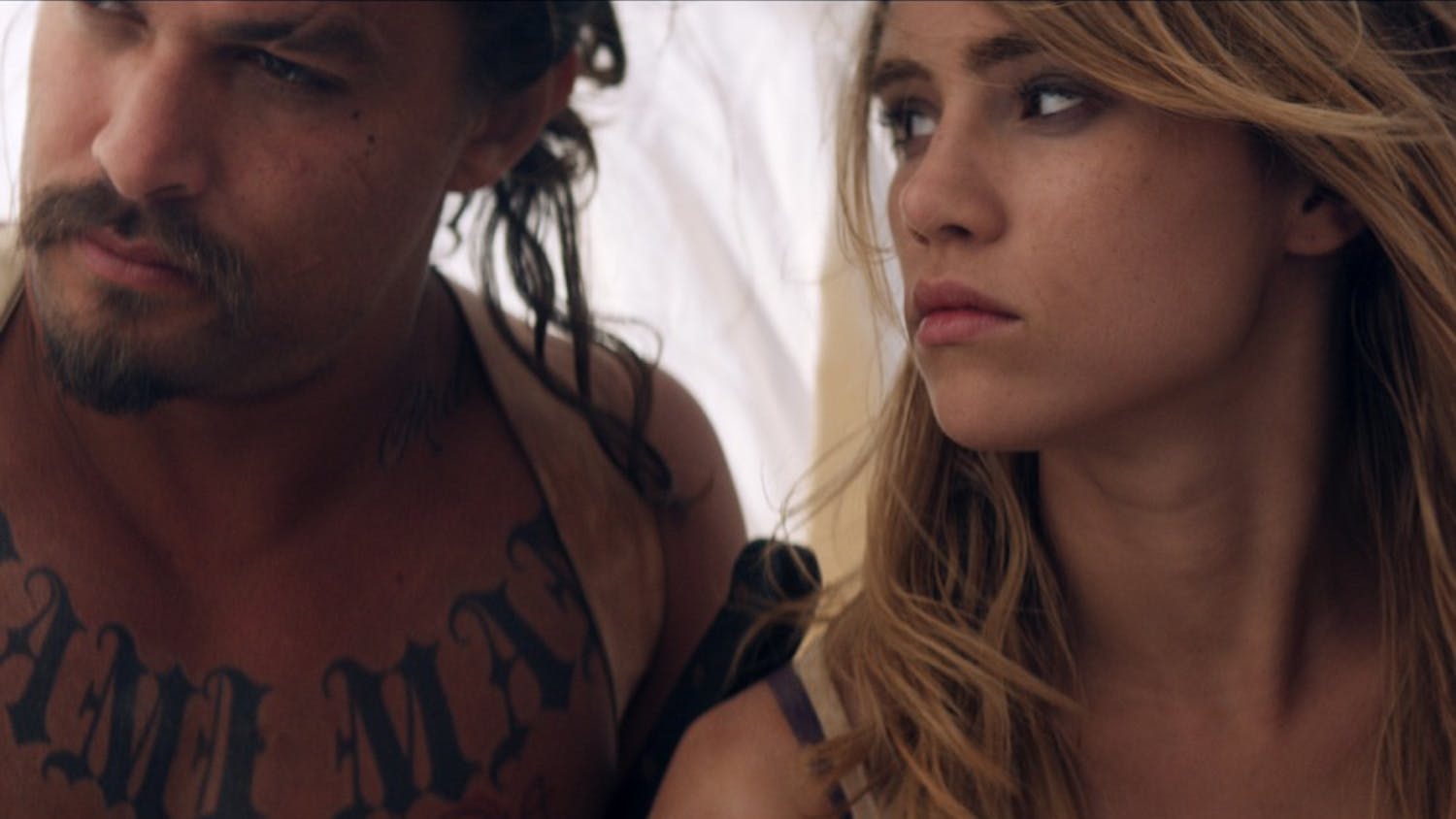 Jason Momoa and Suki Waterhouse star in "The Bad Batch," in theaters June 23.