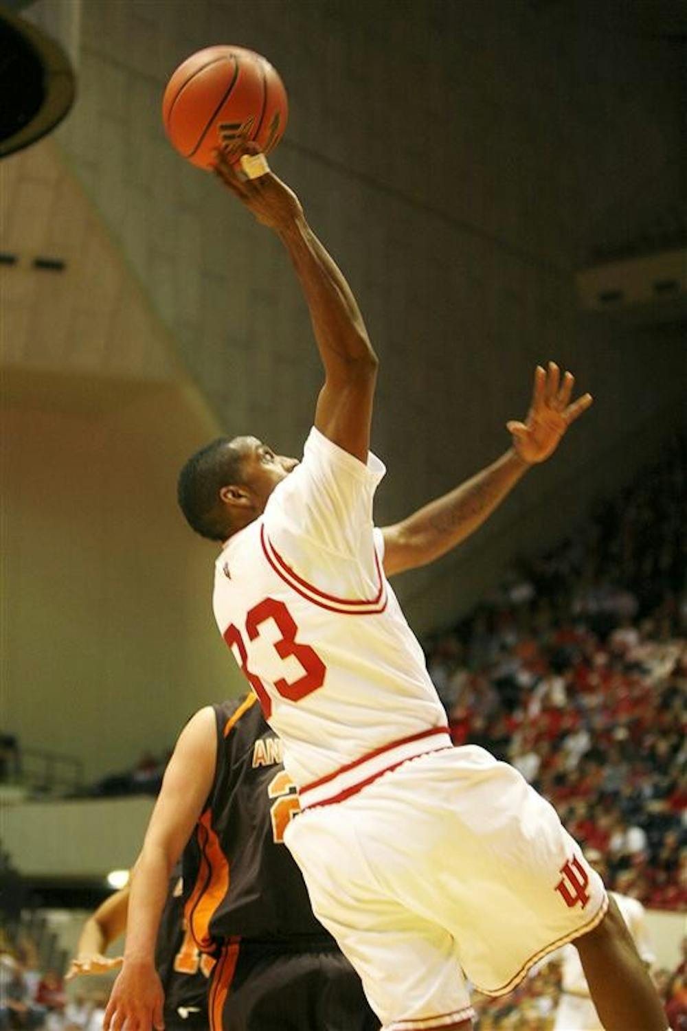 IU junior guard Devan Dumes elevates for a shot during the first half of the the Hoosiers game against Anderson Friday night at Assembly Hall. Dumes finished the first half with a game high 14 points.