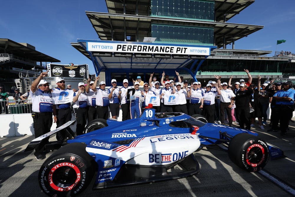<p>Chip Ganassi Racing&#x27;s Alex Palou celebrates achieving the NTT P1 Award at Indianapolis Motor Speedway Sunday, May 21. Palou set the record for the fastest pole speed in Indy 500 history.  </p>