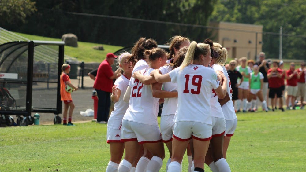 The IU women's soccer team celebrates its first goal of the season, scored by senior forward Annelie Leitner on Sunday, Aug. 19 at Bill Armstrong Stadium. The team is 2-0 in Big Ten Conference play this season.