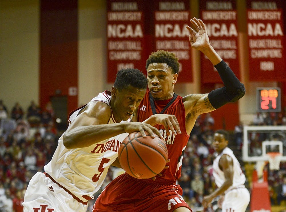 Forward Troy Williams drives to the basket during the game against Austin Peay on Monday at Assembly Hall.