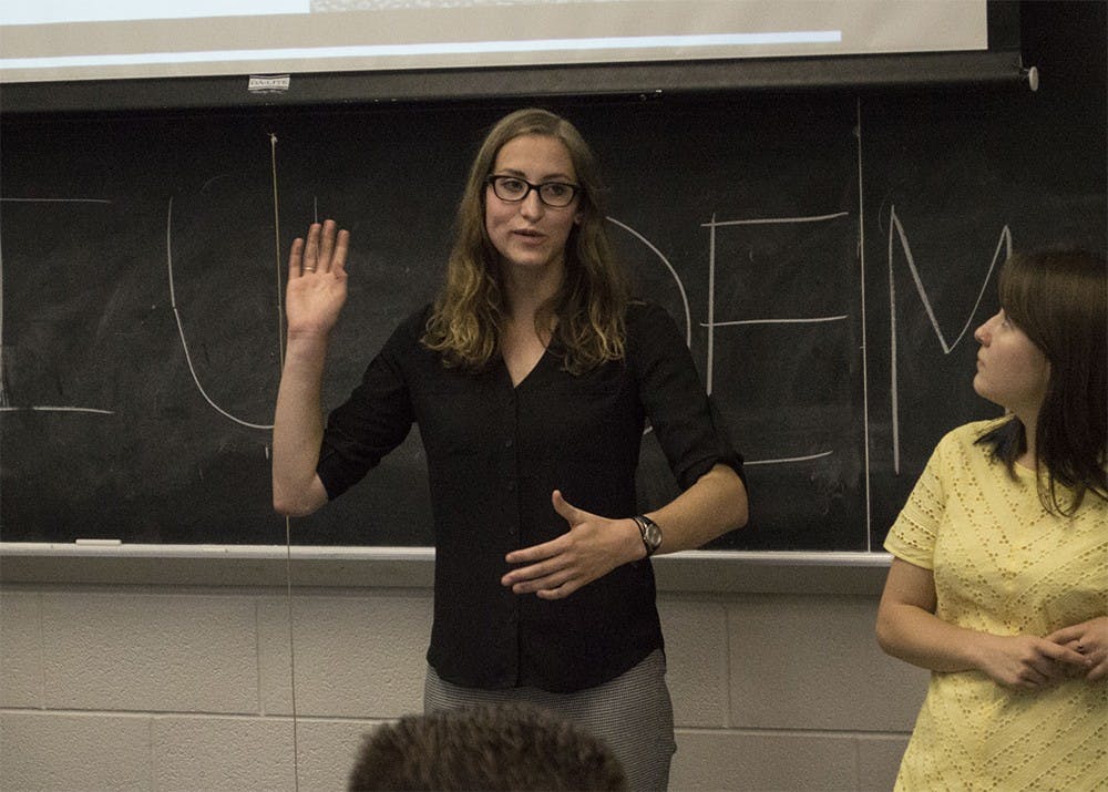 Hannah Miller, president of IU Democrats, speaks with students at the group's callout meeting on Tuesday night.