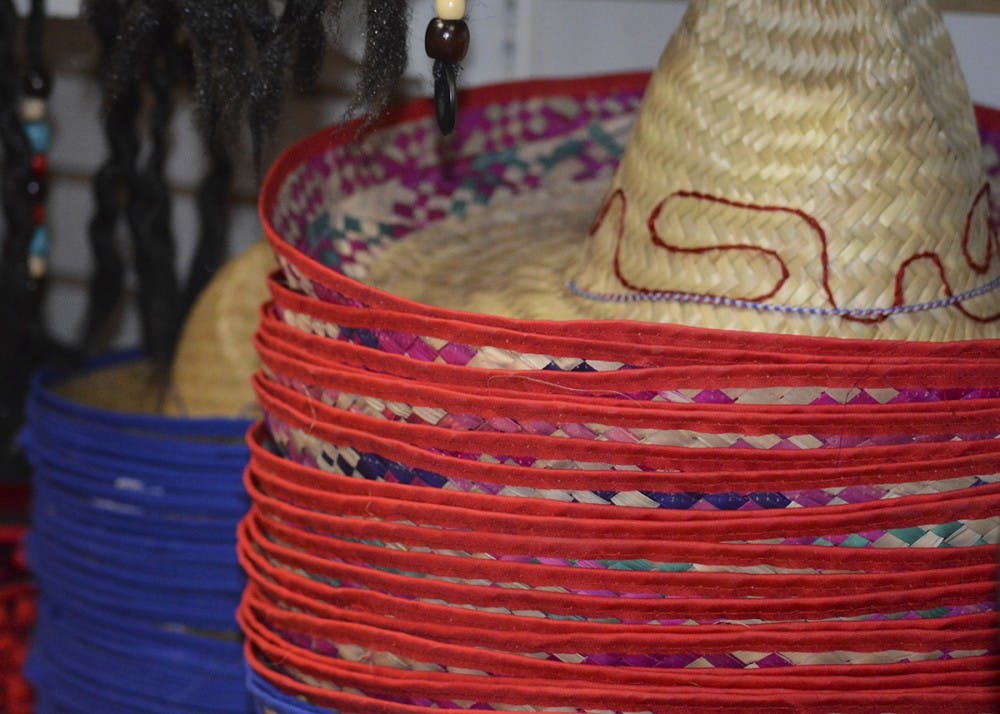 <p>Sombreros sit on shelves along with other hats for Halloween at Campus Costume.&nbsp;</p>
