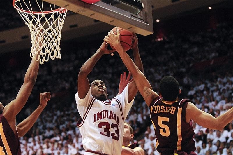 IU guard Devan Dumes goes up for a shot during the first half of IU's 67-63 loss to No. 21 Minnesota  Sunday at Assembly Hall. Dumes had 19 points in the game.