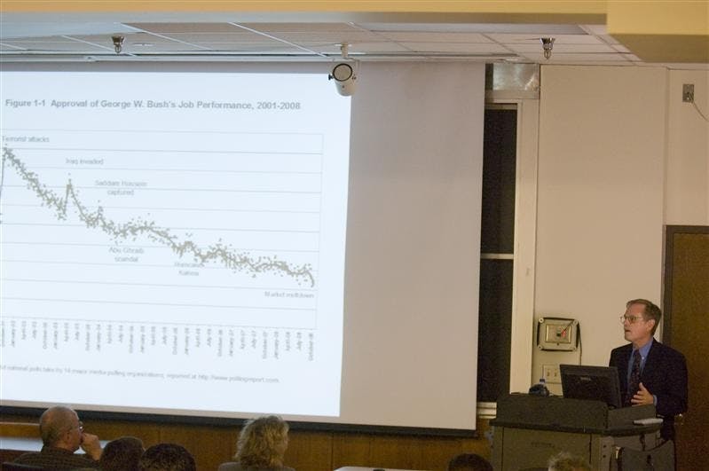Gary Jacobson, a political science professor at the University of California in San Diego, speaks on the Bush Legacy on Wednesday evening in Woodburn Hall.