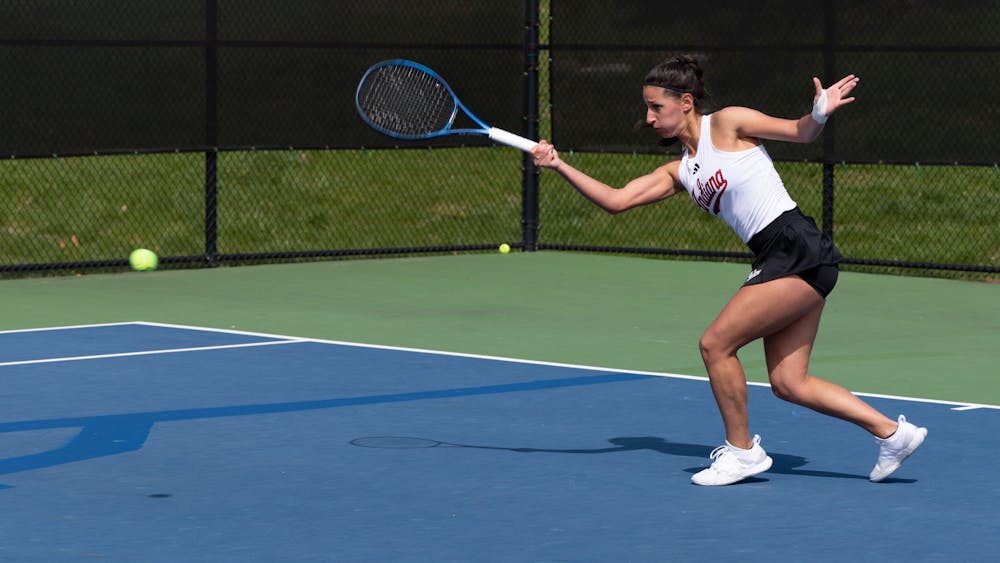 Junior Alexandra Staiculescu battles it out against Michigan State on Saturday, April 8, 2023. Indiana women&#x27;s tennis concluded its regular season with a loss to Wisconsin on Friday.