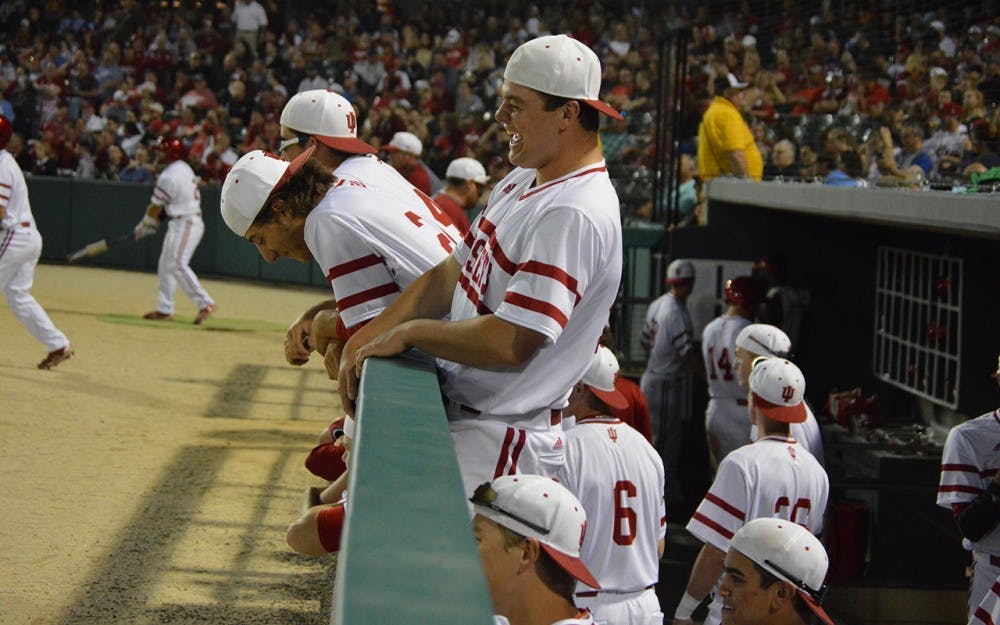 Hoosiers get rowdy in the dugout after gaining a lead over Ball State Tuesday night at Victory Field in Ind. IU beat Ball State 4-3. 