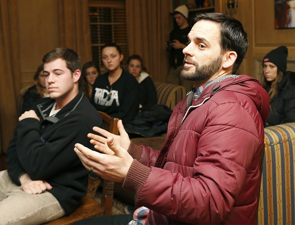 Brandon Shurr, development director at Habitat for Humanity, speaks how to fundraise money effectively during a full group meeting of "The Greeks Give Back Challenge" Wednesday at Sigma Chi house. The organization plans to funraise 70 thousands dollars for Habitat for Humanity till Mar. 15. 