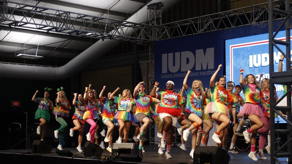 Members of the Indiana University Dance Marathon perform a dance on stage Oct. 28, 2022, at the IU Tennis Center. Participants work in shifts to cover all 36 hours of the marathon.