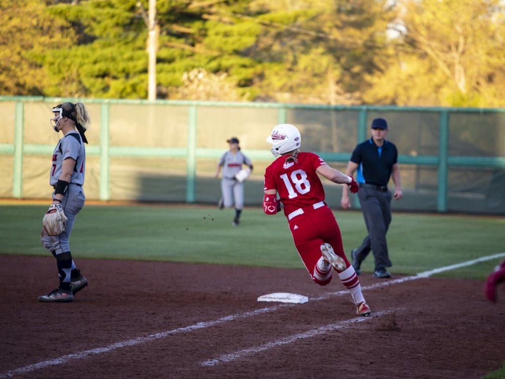 Freshman Avery Parker rounds first base after a hit April 11, 2023, at Andy Mohr Field in Bloomington. No. 2 Indiana softball plays No. 7 Penn State in the Big Ten Tournament quarterfinals Thursday afternoon. 