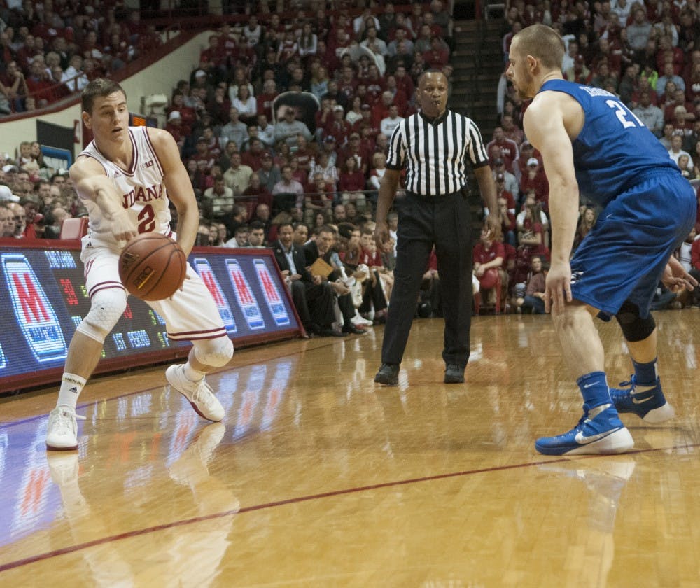 Redshirt senior Nick Zeisloft passes the ball during the game against Creighton on Thursday at Assembly Hall.