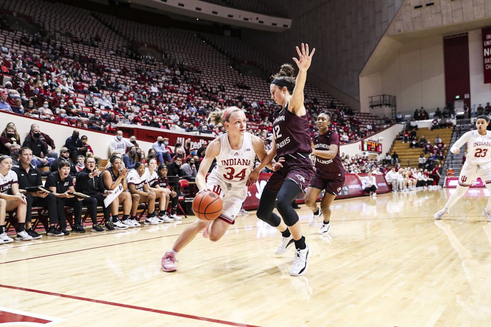 <p>Senior guard Grace Berger drives to the basket against Southern Illinois University on Dec. 23, 2021, at Simon Skjodt Assembly Hall. Indiana&#x27;s record in Big Ten play moved to 6-1 following a 65-50 defeat to Michigan on Jan. 31, 2022.</p>