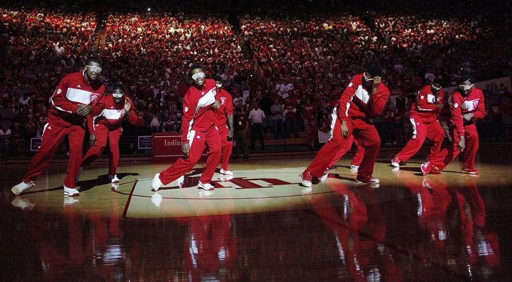 The men's basketball team dances during Hoosier Hysteria on Oct. 4, 2013.