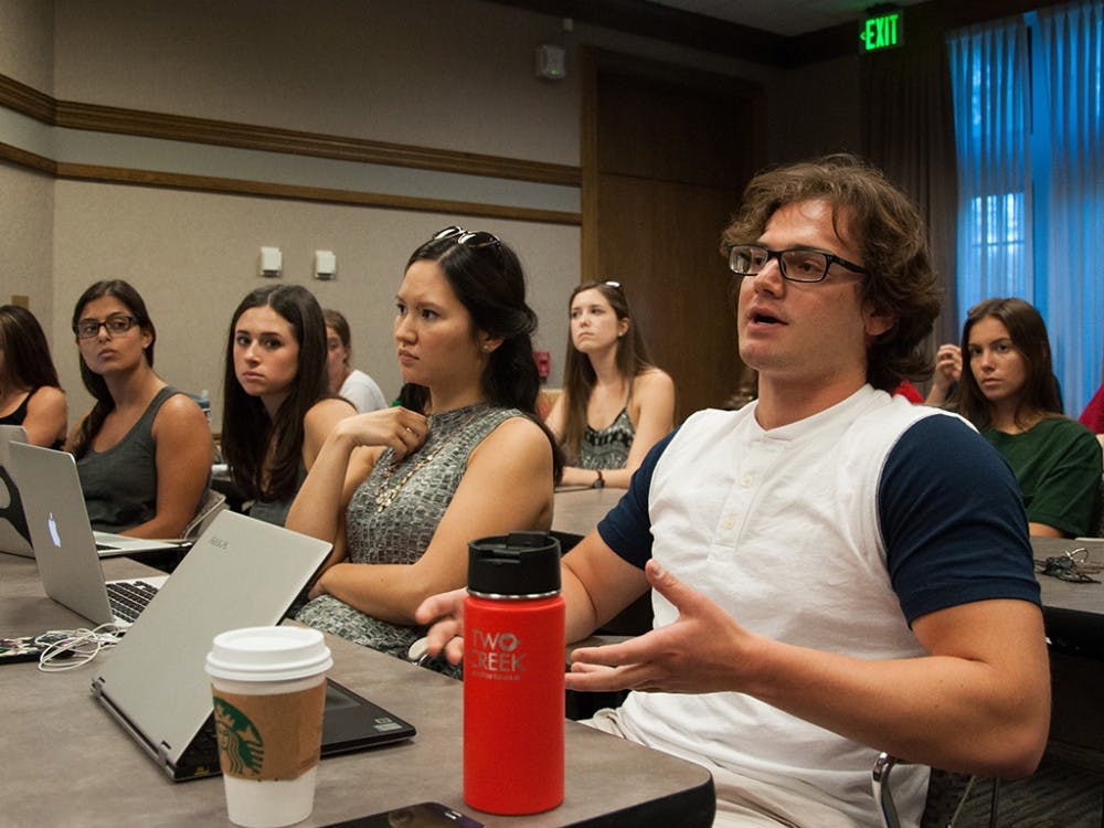 Presidents of different chapters comment on the details of the agreement in Greek policy meeting on Monday evening in the Dogwood Room of the Indiana Memorial Union.