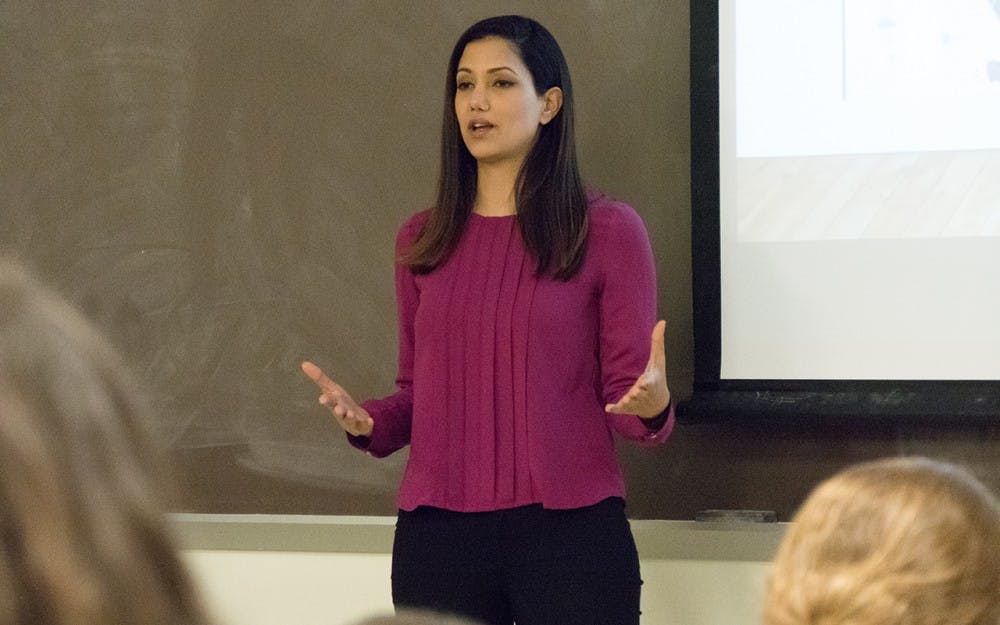 Former IDF soldier Lital shares her life story at Woodburn Hall on Monday.  Lital, along with fellow former IDF soldier Mohammed, are touring around America educating young adults on Israel and its people.