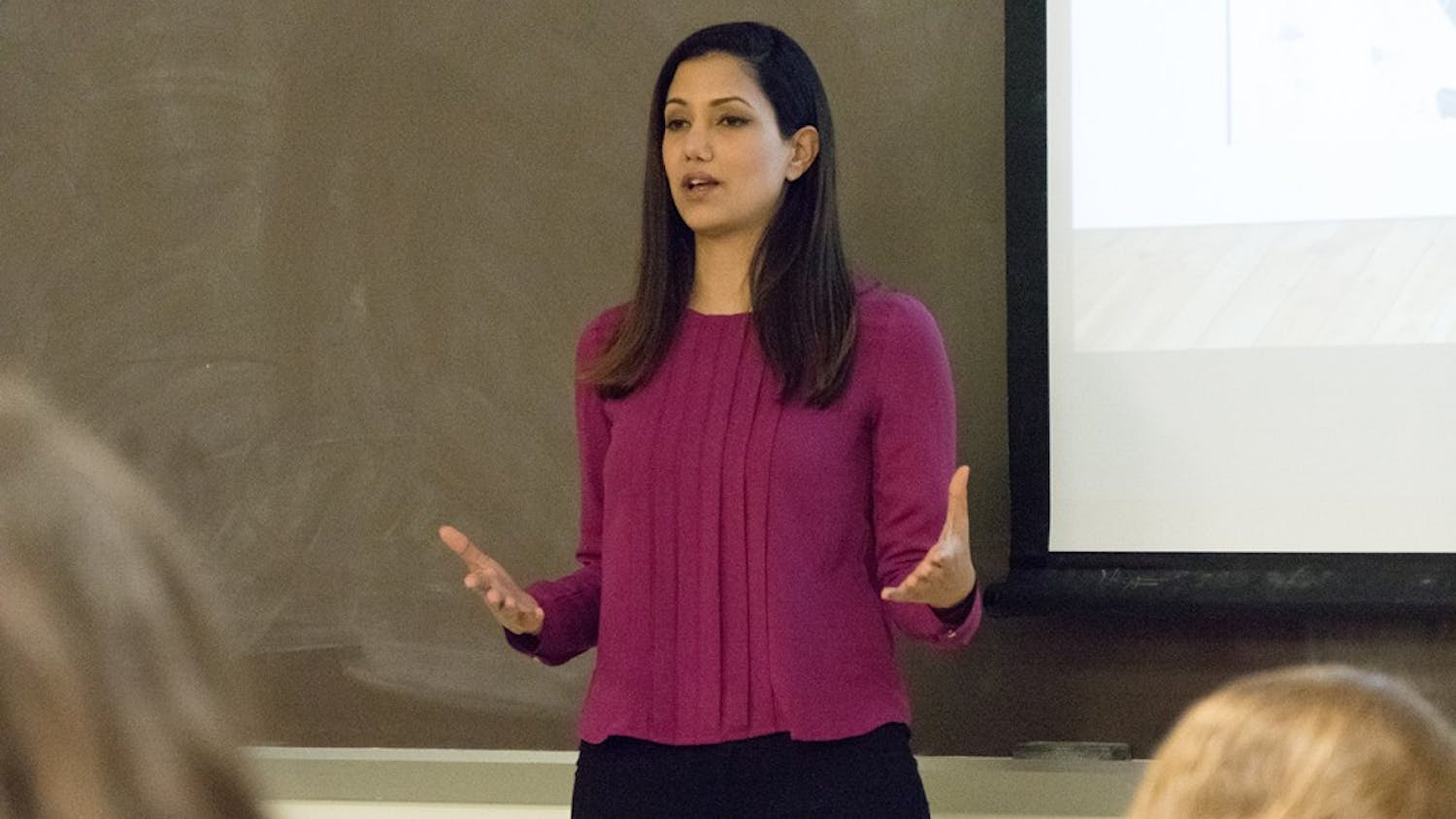 Former IDF soldier Lital shares her life story at Woodburn Hall on Monday.  Lital, along with fellow former IDF soldier Mohammed, are touring around America educating young adults on Israel and its people.