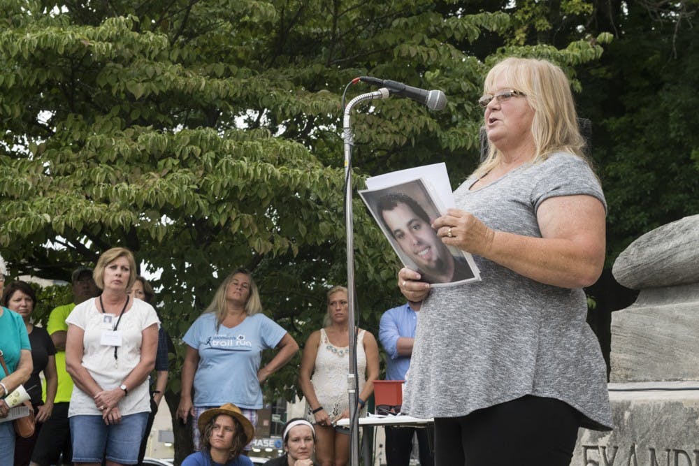 Terry Eads speaks outside the Monroe County Courthouse about overdose awareness. After losing a son to an overdose, Eads works to further overdose education.