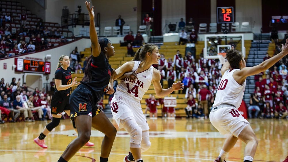 Redshirt junior guard Ali Patberg fights to defend senior Kaila Charles on Feb. 6 in Simon Skjodt Assembly Hall. Patberg scored 29 points in the Feb. 22 game against Minnesota. 