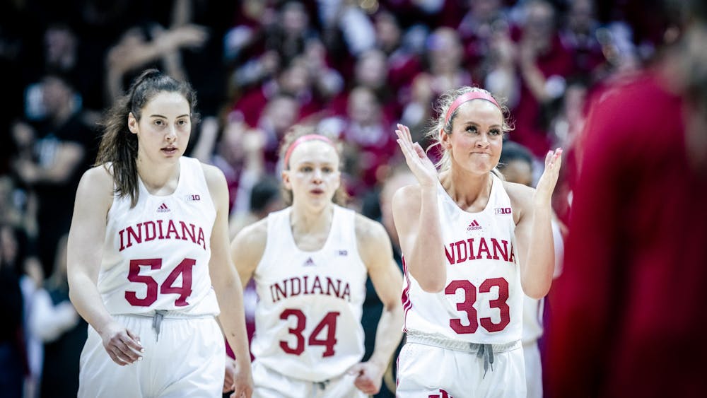Senior forward Mackenzie Holmes and junior guard Sydney Parrish celebrate a scoring run Jan. 26, 2023, at Simon Skjodt Assembly Hall in Bloomington. The Hoosiers beat Ohio State 78-65.
