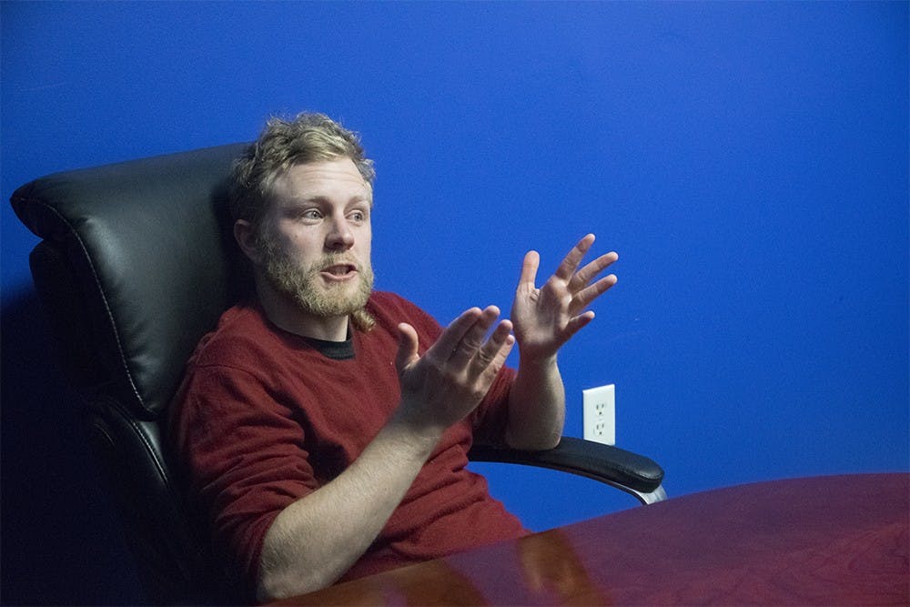 Chris Waggoner introduces his business of the Bloomington Data Collective on Wednesday evening at Cowork. BDHC offers talk in IT frequently and free programing tutorial every Wednesday from 6pm to 7pm.