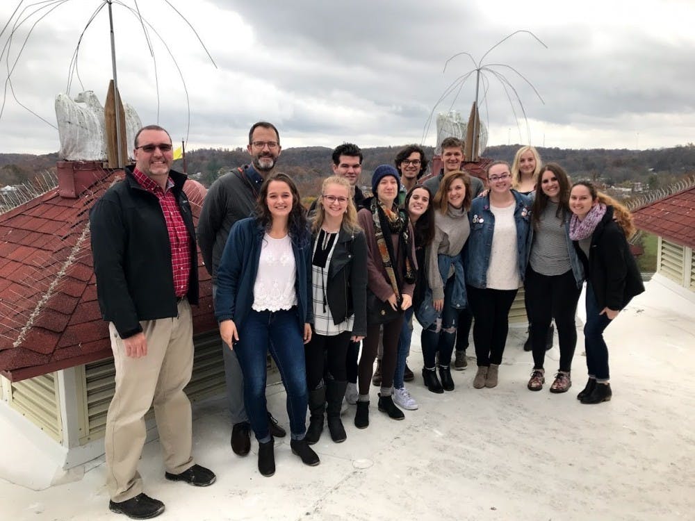 <p>The comprehensive design class stands on the roof of the West Baden Springs Hotel near Paoli, Indiana. Comprehensive design, a major within the School of Art, Architecture + Design, was created a little less than two years ago to fill the gap between different areas of design offered.</p>
