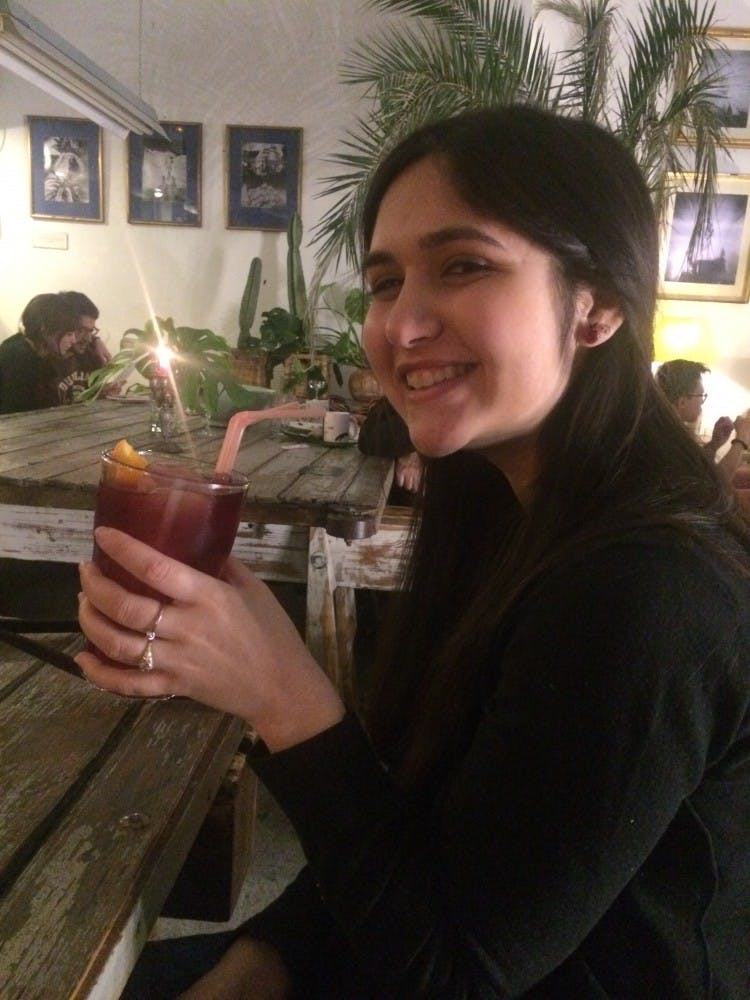 Alyson Malinger enjoys her first legal drink directly at midnight April 2nd, her 21st birthday. This night was nothing she had imagined her 21st being, but it was even better in her eyes.