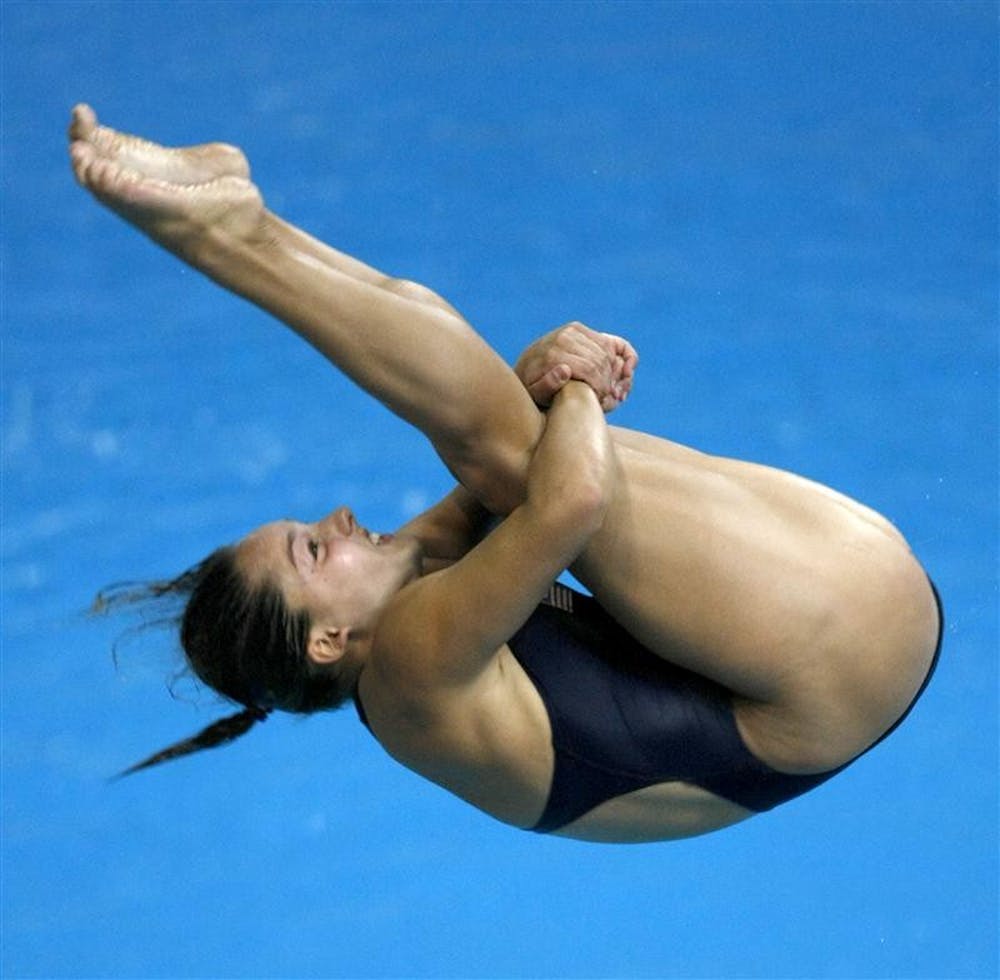 USA's Christina Loukas of Riverwoods, Illinois, does a forward 3-1/2 somersault dive while competing in the women's 3M Springboard finals on Sunday, August 17, 2008, in the Games of the XXIX Olympiad in Beijing, China.