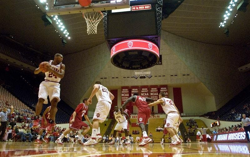 IU junior forward Steven Gambles grabs a rebound for the Cream team during a scrimmage during the "Haunted Hall of Hoops" on Oct. 31 at Assembly Hall. The team will open the season with a game verses Anderson at 7 p.m. tonight at Assembly Hall.