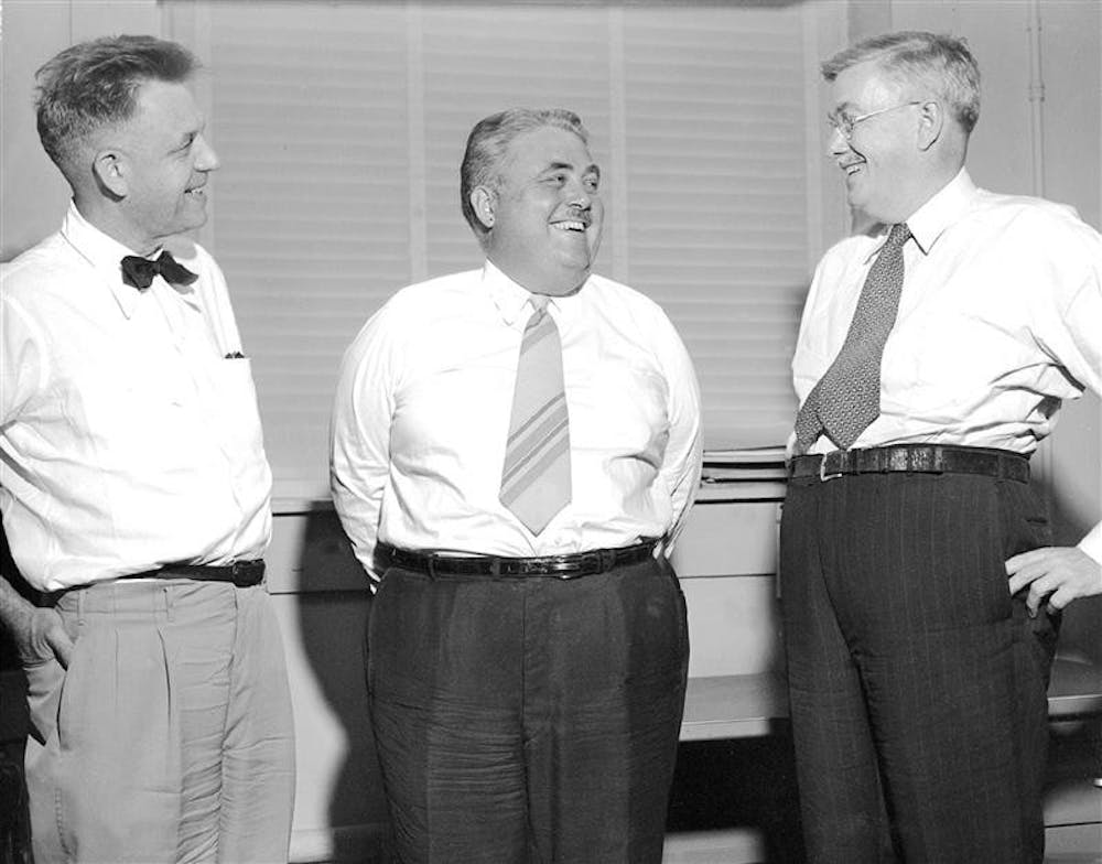 Famed IU President Herman B Wells (center) is a beloved former campus figure, but his days in office were often full of controversy.
