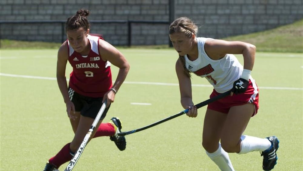 Junior Audra Heilman goes after the ball during the game against Lousiville Aug. 24 at the IU Field Hockey Complex.


