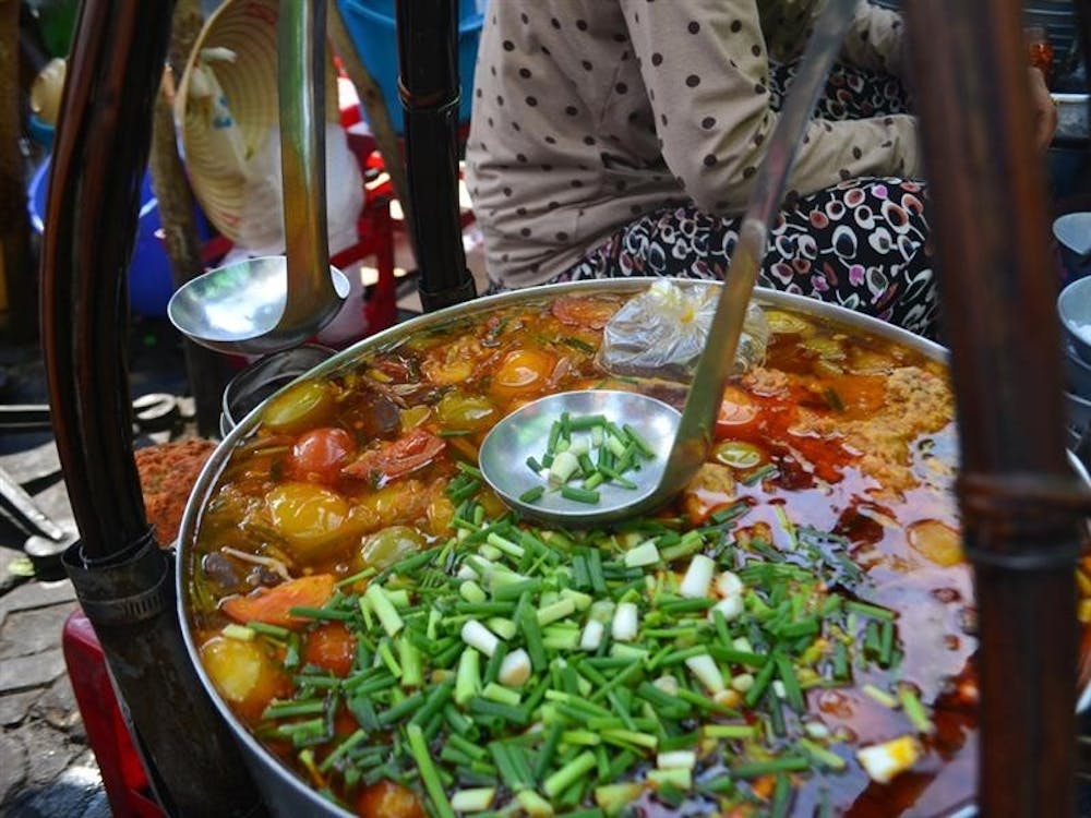 Pho soup boils in Vietnam. 