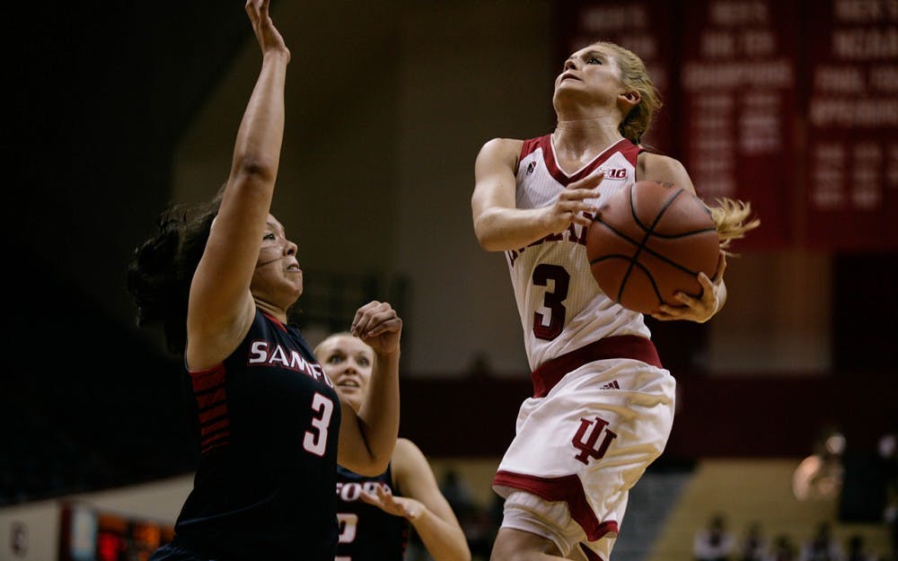 Then Sophomore guard Tyra Buss goes up to the basket for a layup against Samford Dec. 11. Buss led the Hoosiers in scoring, putting up 21 points along with 9 rebounds to help IU beat Samford 65-56 in overtime. 