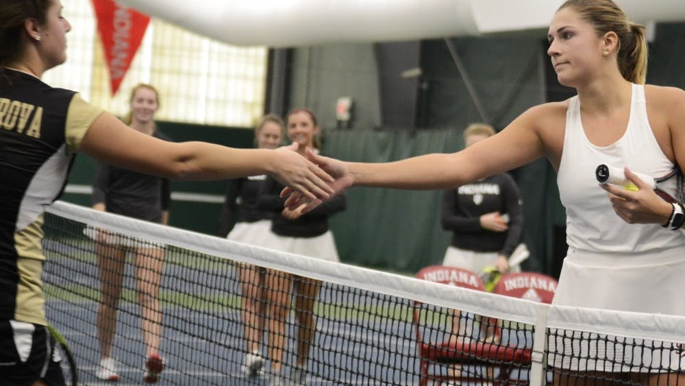 Junior Natalie Whalen shakes hands with her opponent after her 6-4, 7-6 win over Western Michigan University on Jan. 20. Whalen was the only IU player to win her match Saturday at No. 5 Northwestern.&nbsp;