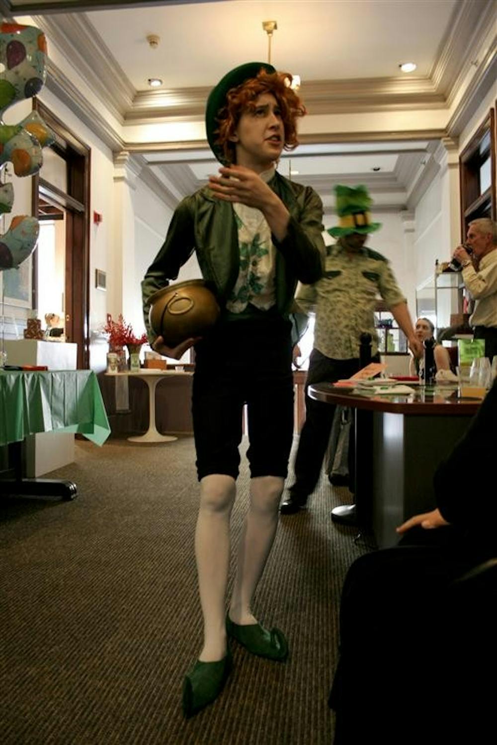 The "Leprechaun", IU Sophomore Kaylee Spivey, mingles with attendees of the 1st annual Leprechaun's Birthday at the Waldron Arts Center on Wednesday evening.  The event was the sixth of 35 events being held at the Center to celebrate it's 35th anniversary.