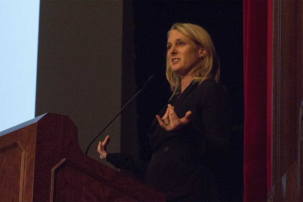 Piper Kerman, author of "Orange is the New Black: My Year in a Women's Prison", explains the time before she was sent to prison at the beginning of a lecture put on by Delta Gamma on Tuesday in Alumni Hall. Kerman's memoir has since been adapted into a Emmy-winning Netflix series.