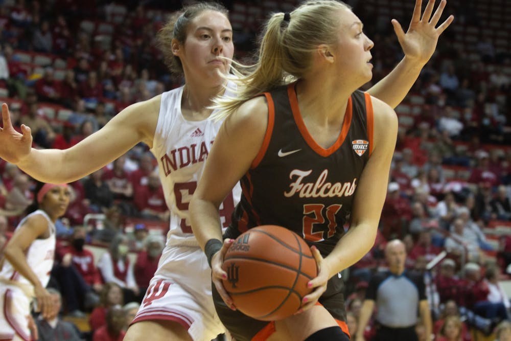 <p>Senior guard Mackenzie Holmes blocks a Bowling Green player Nov. 17, 2022, at Simon Skjodt Assembly Hall. Indiana continues its winning streak after defeating Bowling Green 96-61.</p>