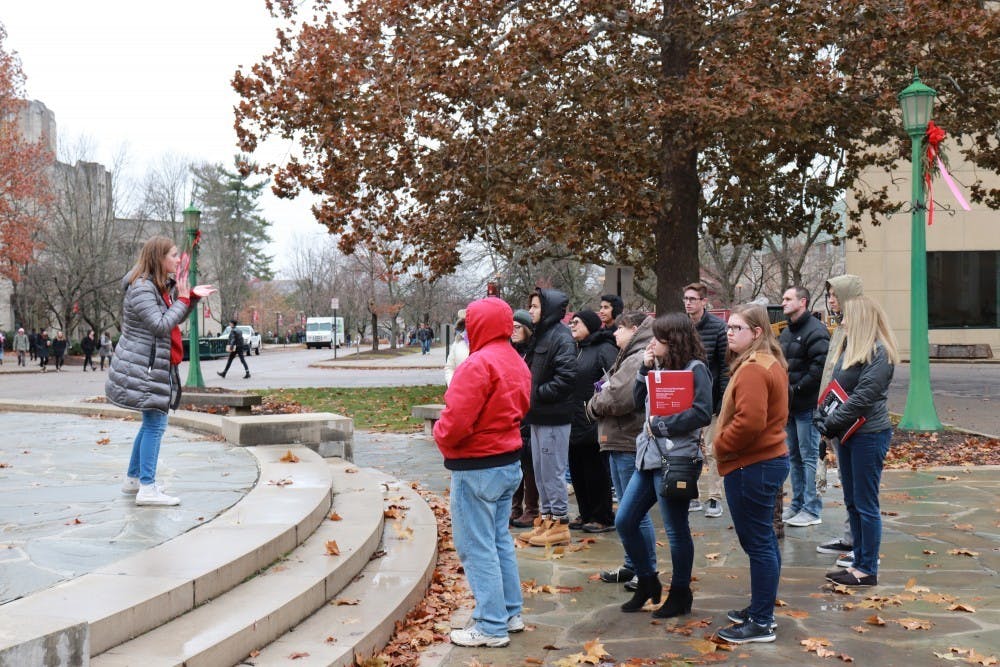 <p>IU student orientation leaders give campus tours to high school students in Nov. 26, 2018, in front of the Fine Arts Building. Nationwide, enrollment has decreased 1.1%  since last fall, while IU has seen an increase of students enrolled in the fall semester from 45,328 last year to 47,005 this year.</p>