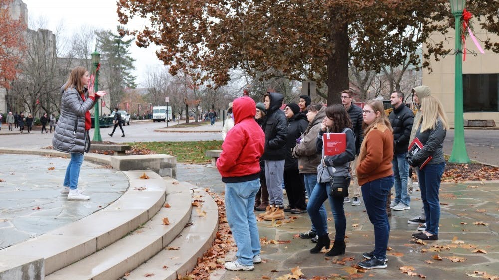 IU student orientation leaders give campus tours to high school students in Nov. 26, 2018, in front of the Fine Arts Building. Nationwide, enrollment has decreased 1.1%  since last fall, while IU has seen an increase of students enrolled in the fall semester from 45,328 last year to 47,005 this year.
