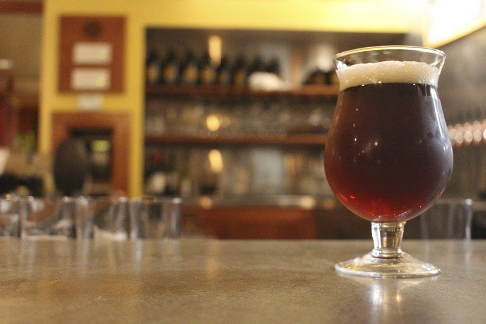 A pint of winter ale sits atop the bar at Lennie's Restaurant and Brew Pub. 
