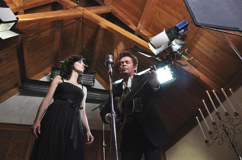 John Mellencamp and Karen Fairchild of Little Big Town film scenes for Mellencamp's "A Ride Back Home" music video Tuesday at the Beck Chapel. Mellencamp's latest album "Life, Death, Love and Freedom" was recorded in Bloomington and was recognized by Rolling Stone Magazine as one of the top 50 albums of 2008.