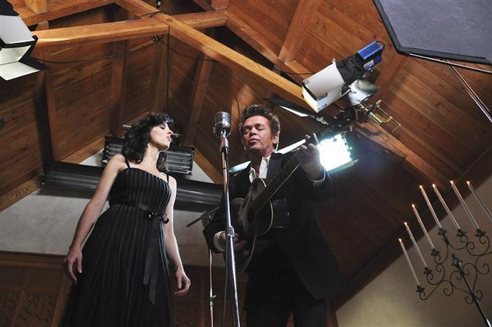 John Mellencamp and Karen Fairchild of Little Big Town film scenes for Mellencamp's "A Ride Back Home" music video Tuesday at the Beck Chapel. Mellencamp's latest album "Life, Death, Love and Freedom" was recorded in Bloomington and was recognized by Rolling Stone Magazine as one of the top 50 albums of 2008.