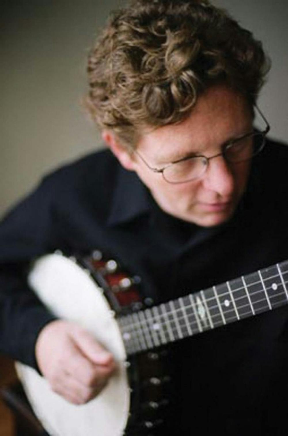 Nothing says badass quite like middle age, glasses and a banjo – in the softest focus you can imagine.