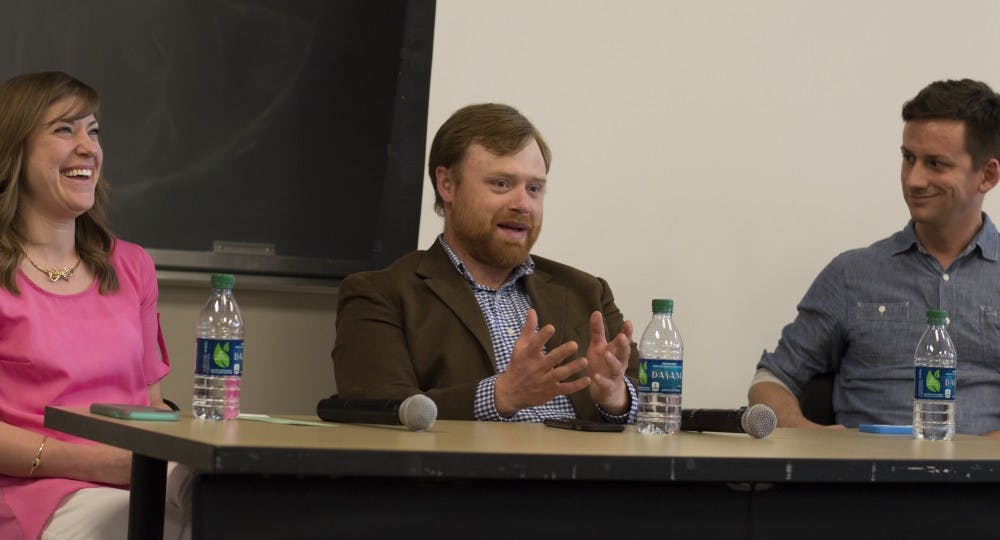 (From left) Amy Bartner, digital engagement manager at the Indy Star, Zach Osterman, sports and IU Insider reporter for the Indy Star, and Jonathan Scott, the former digital chief for Indianapolis Monthly, discuss social media as a career at a panel in Ernie Pyle Hall on Monday. They discussed their biggest social media blunders, which included tweeting pictures of their cats from official publications' Twitter accounts.