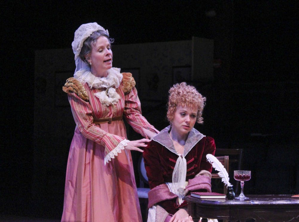 Jenny McKnight, left, and Ashley Dillard, rehearse their roles in Sense and Sensibility on Tuesday night at the Wells-Mets Theater. The show will be put on July 9. 