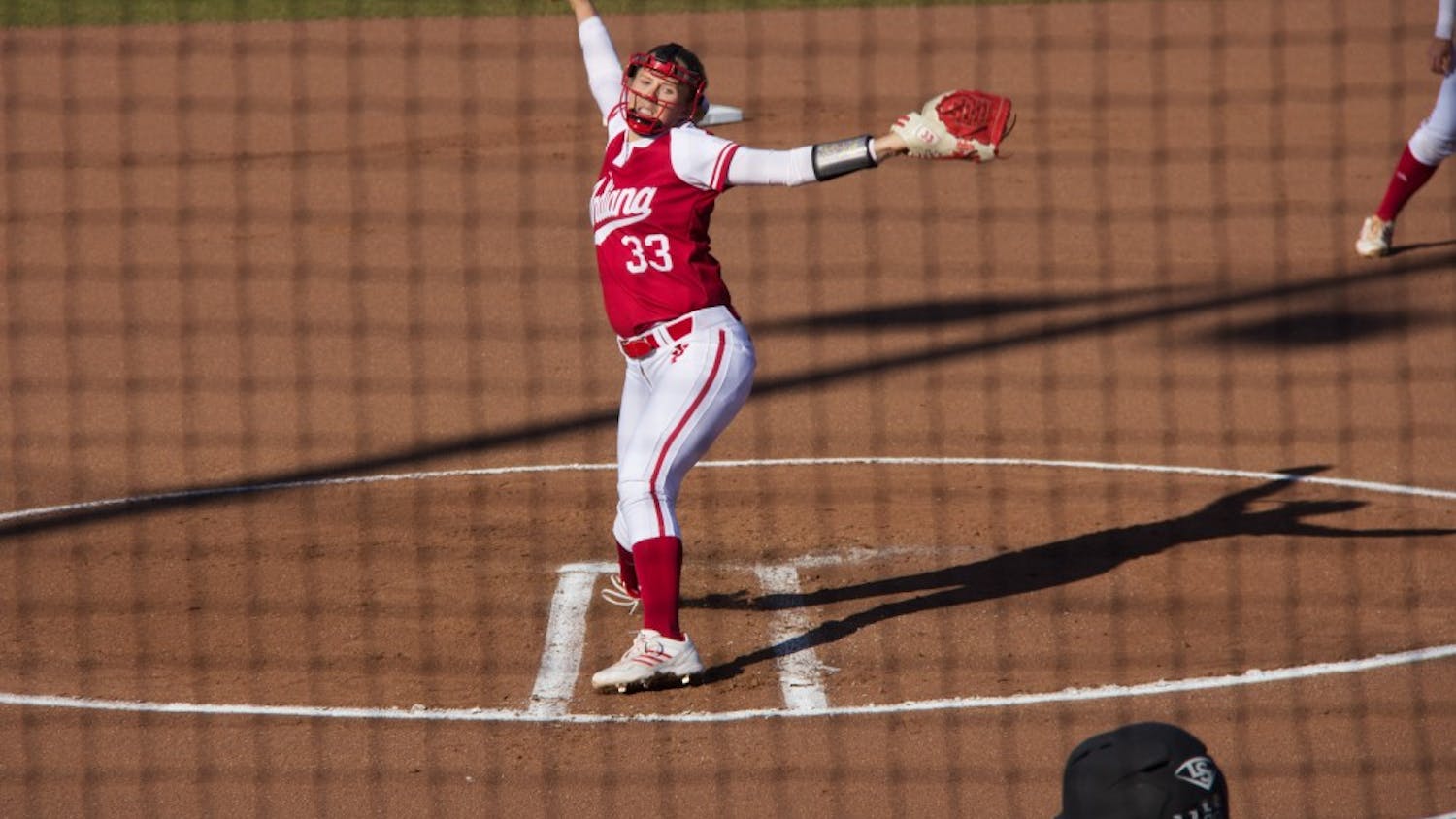 Then-freshman pitcher Tara Trainer, now a junior, throws a pitch during a 2016 game against the University of Louisville at Andy Mohr Field in Bloomington.