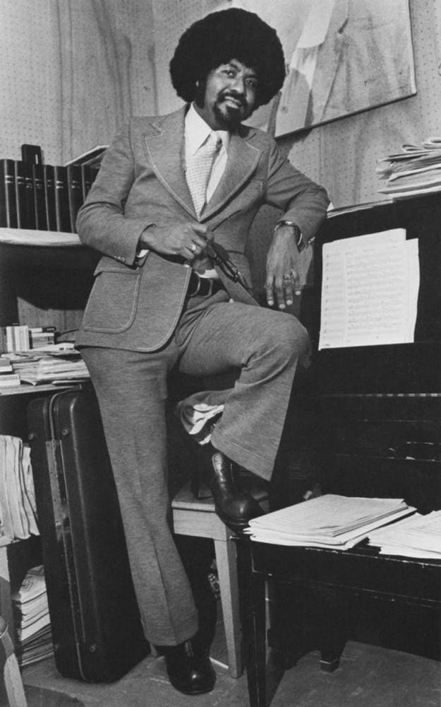 David Baker, a former writer, composer and IU professor, poses in his studio in the 1970s.&nbsp;