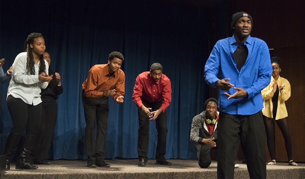 Merselis Byers, center, presents the showcase named "Letters To The Editor" during "The Emergent Theatre Project" performance at the Whittenberger Auditorum in the IMU on Sunday. 