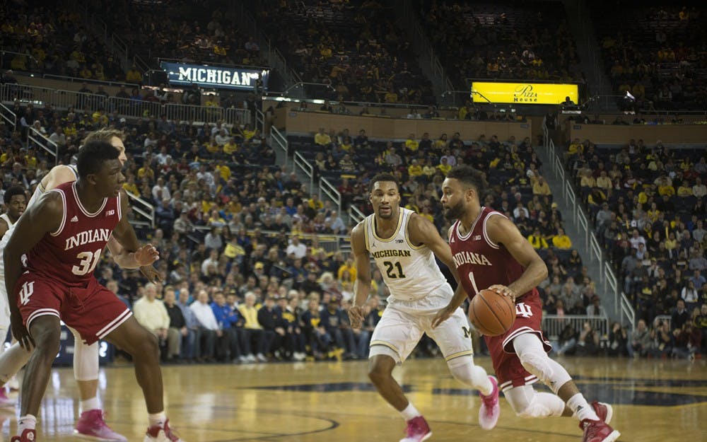 Junior guard James Blackmon Jr. drives to the basket during IU's loss to Michigan on Thursday. Blackmon scored just 4 points in the loss and will be out indefinitely after an injury sustained during the game.