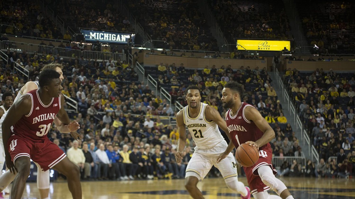 Junior guard James Blackmon Jr. drives to the basket during IU's loss to Michigan on Thursday. Blackmon scored just 4 points in the loss and will be out indefinitely after an injury sustained during the game.