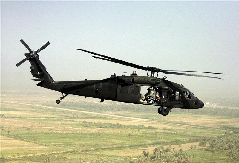  A US Army Blackhawk helicopter flies over a rural area of the Diyala province in this Wednesday, June, 25, 2008 file photo. Two U.S. helicopters crashed Monday in northern Iraq, killing four American troops, the U.S. military said.